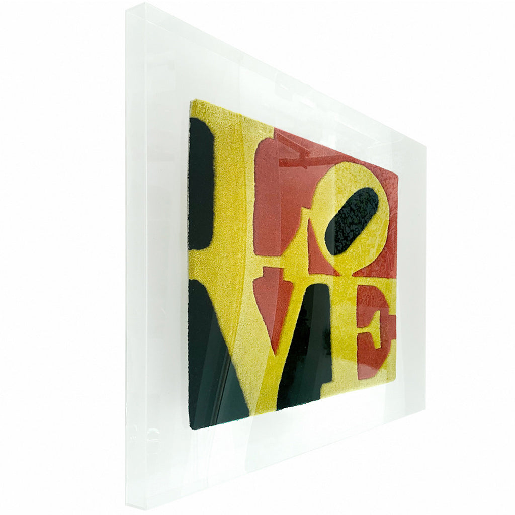 Love Black Yellow Red Carpet by Robert Indiana on acrylic box